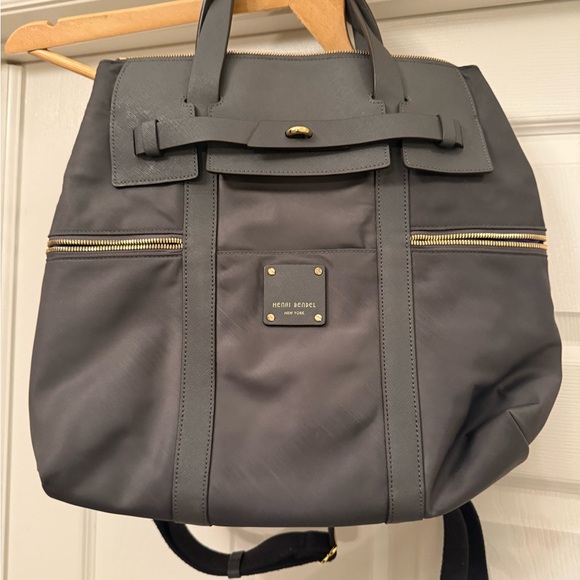 henri bendel Other - Henri Bendel Gray Backpack with Gold Details No lock for bag.